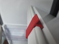 Halter für Gefrierfachklappe